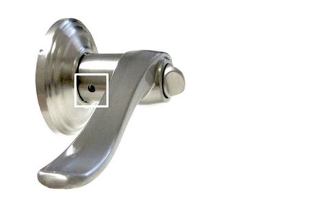 A Hi Senior66, For the Chelsea, the dimension from the center of the handle borehole to the bottom screw hole is 9-1116. . Kwikset door handle set screw